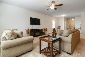 Spotless and naturally lit living room interior in a Brentwood, TN home